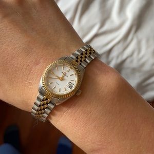 Gold and stainless steel watch